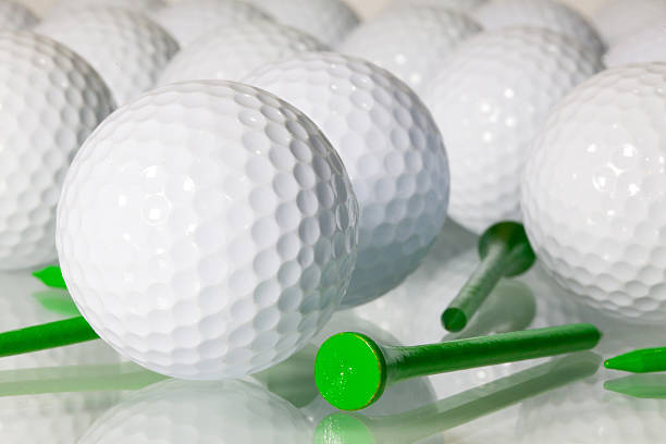istock Many golf balls on a glass table 464832785
