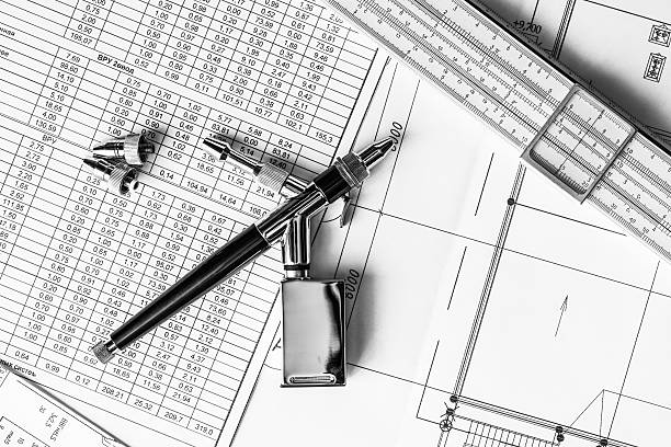 istock Airbrush and a ruler on the table with the schemes 464832794