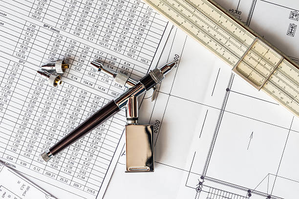 istock Airbrush and a ruler on the table with the schemes 464833116
