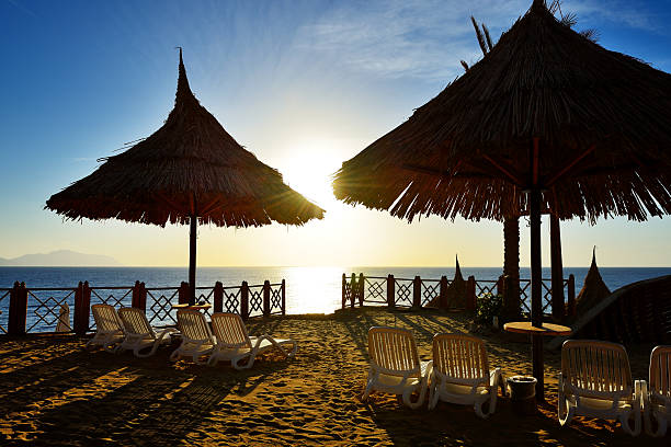 istock Sunrise and beach at the luxury hotel 464835797