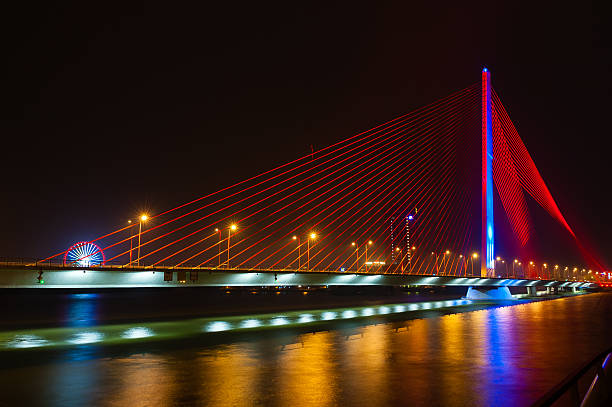 istock Night view of bridge Danang Vietnam 464836340