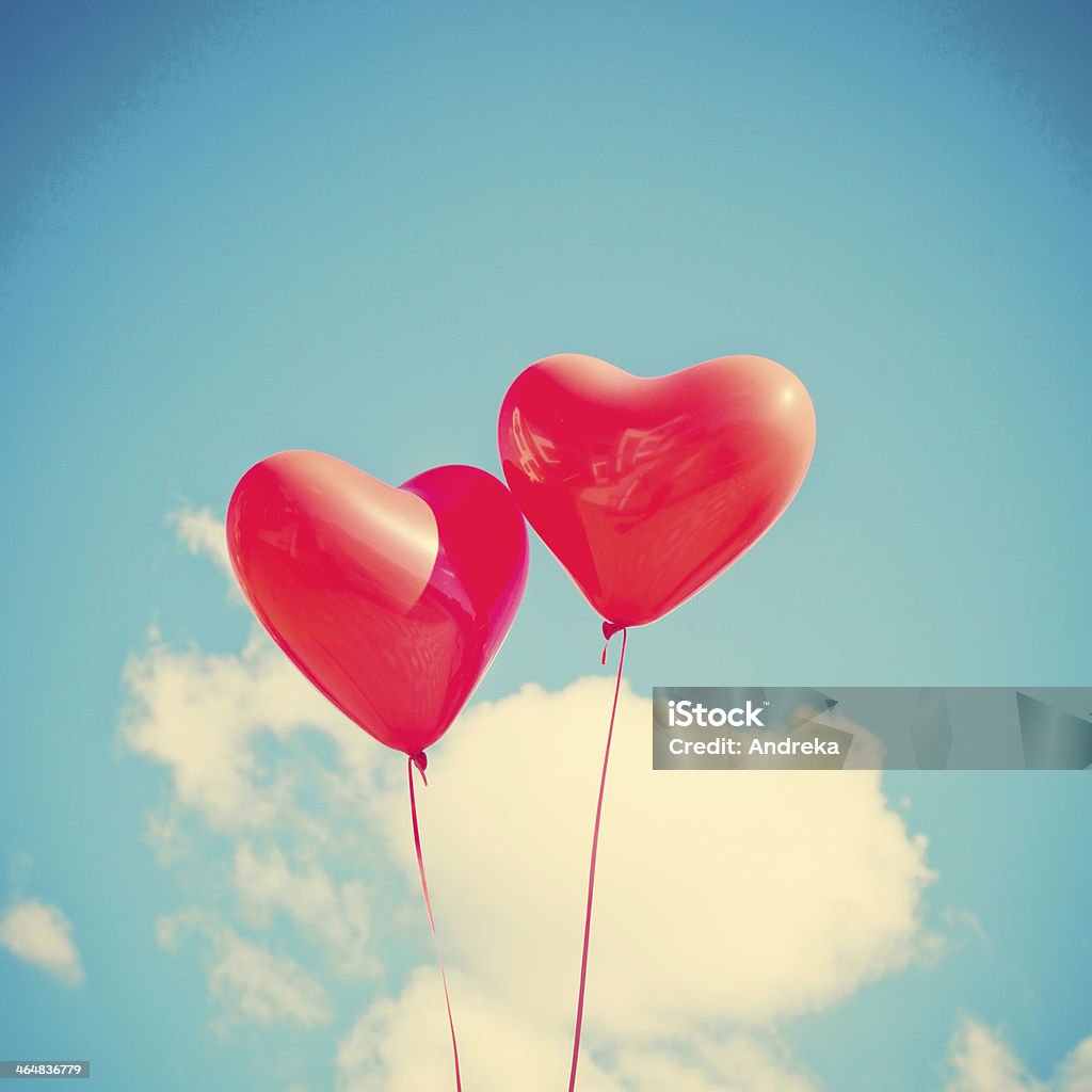 Two Hearts Two red heart-shaped balloons Heart Shape Stock Photo