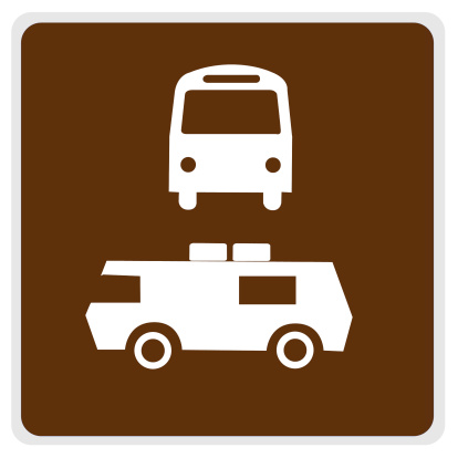 road sign - brown, white bus camper parking - with paths