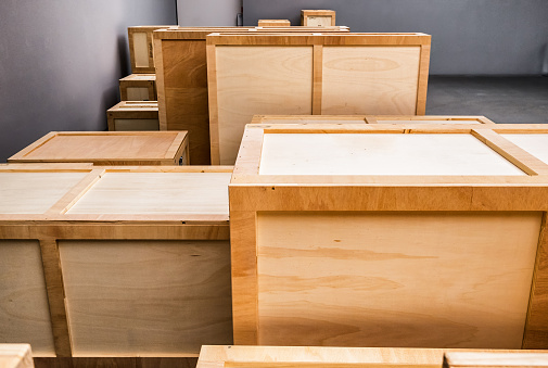 group of wooden boxes at a warehouse