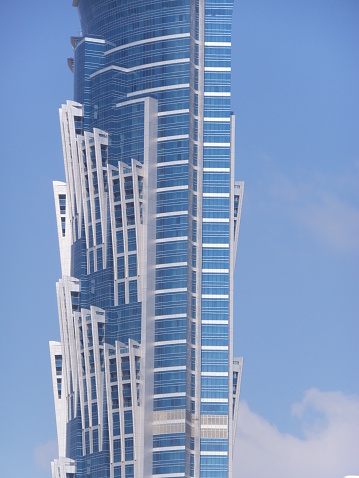 Dubai, UAE - February 19, 2014: JW Marriott Marquis Dubai, UAE. It is the worlds tallest hotel, a 72-storey, 355 m (1,165 ft) twin-tower skyscraper complex.