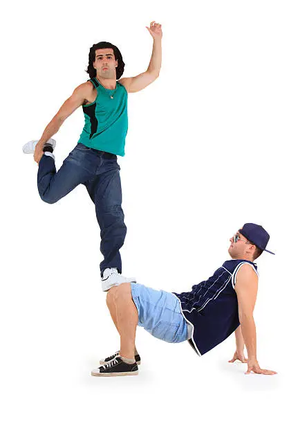 young male dancers performing a bboying stunt