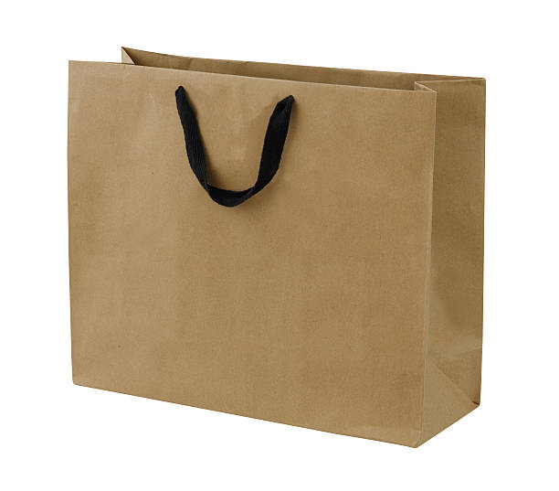 istock Simple browse recycled paper bag isolated on white background 464840017