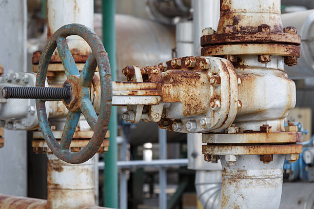 istock old gate valve in petrochemical plant 464840027