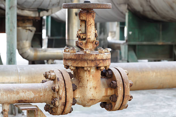 istock old gate valve in petrochemical plant 464840197