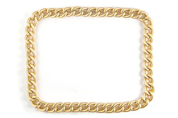 istock Golden chain of twisted rings. Isolated on white 464842582