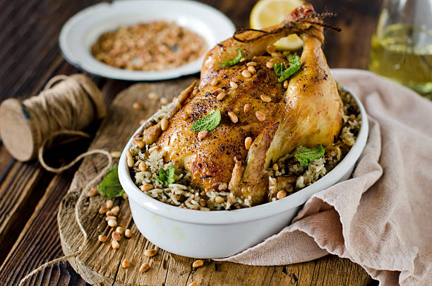 relleno de pollo con arroz y piñones - stuffing fotografías e imágenes de stock