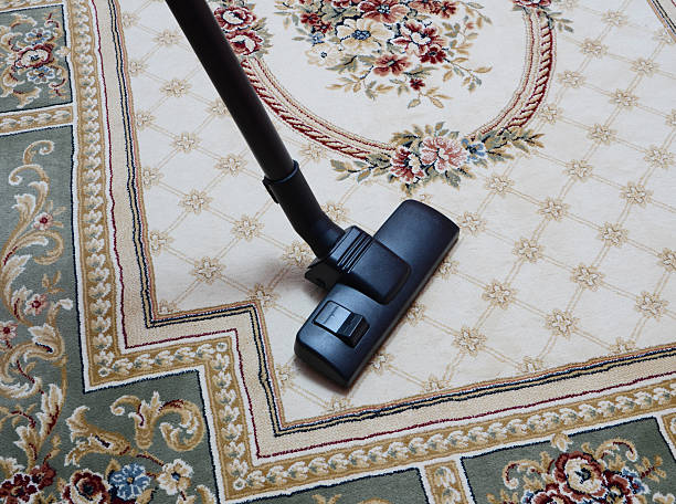 istock carpet vacuuming with vacuum cleaner 464844052