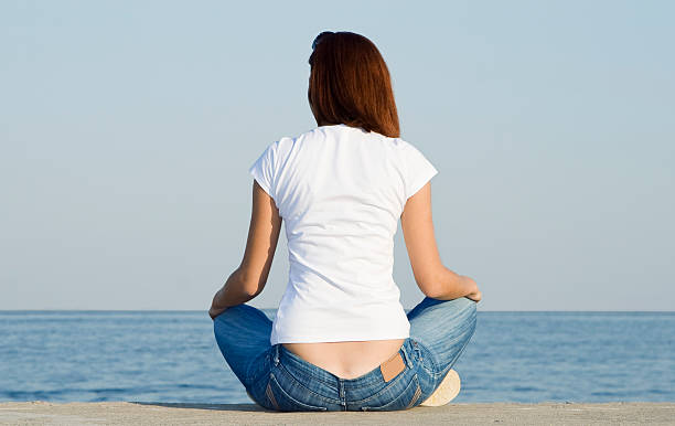 istock Young female looking to the ocean 464846459