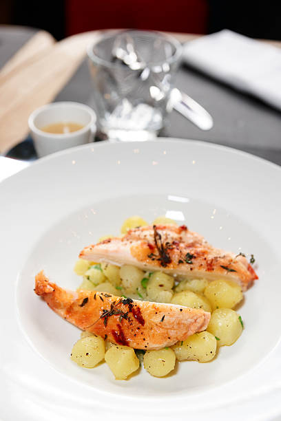 istock Chicken breast with potatoes on plate 464847233