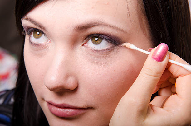 istock Makeup artist  colors eyelashes model 464847447