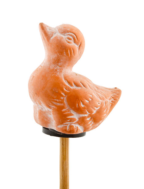 istock Duck in clay on wooden stick 464847591