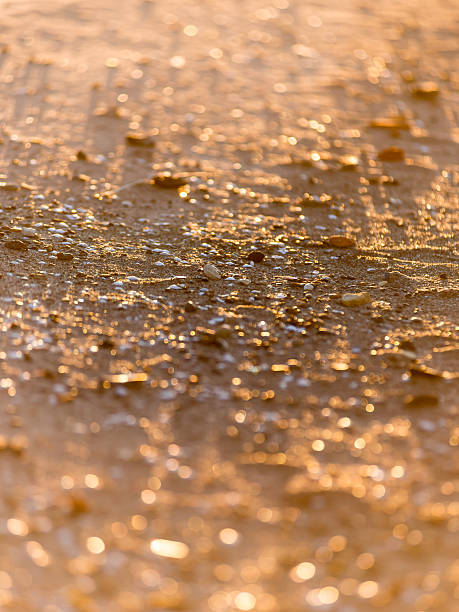 istock abstract shiny rocks on the beach 464847654