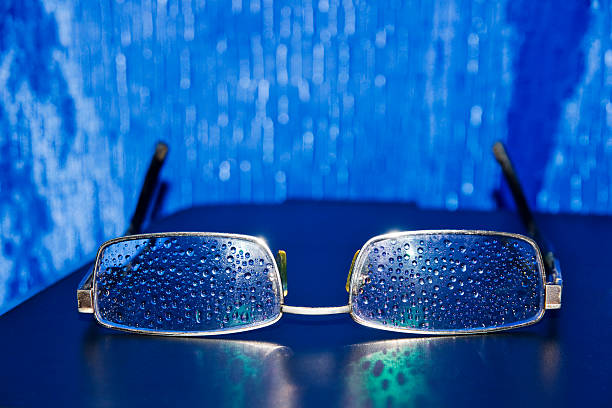 Spectacles of water droplets on the glasses