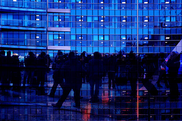 istock People walking with business building background 464849730