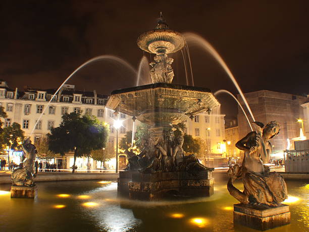 istock Urban fountain by night 464849856