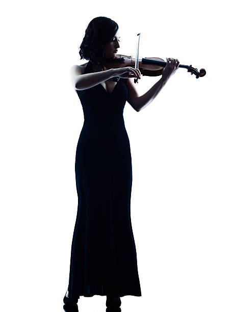 violinista mujer slihouette aislado - violinista fotografías e imágenes de stock