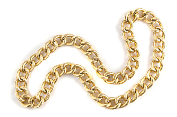 istock Golden chain of twisted rings. Isolated on white 464853354