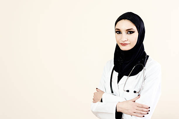 istock Muslim female doctor in a white coat 464856526