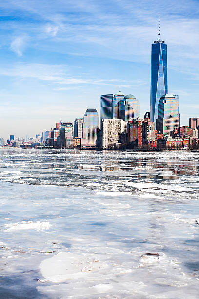 This is a square mobile stock photograph of the Freedom Tower viewed from the West Village during a sunny winter afternoon.