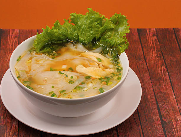 istock Glass noodle chicken soup thai style 464860356