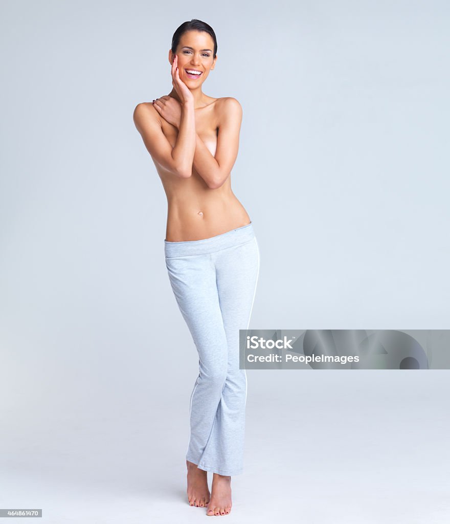 I love feeling light and fit! Cute young woman standing topless while wearing yoga pantshttp://195.154.178.81/DATA/istock_collage/0/shoots/780938.jpg Naked Stock Photo