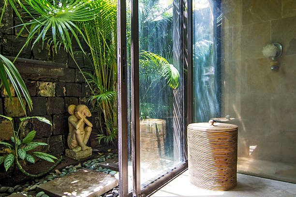 istock Bathroom with access to the tropical garden 464862879