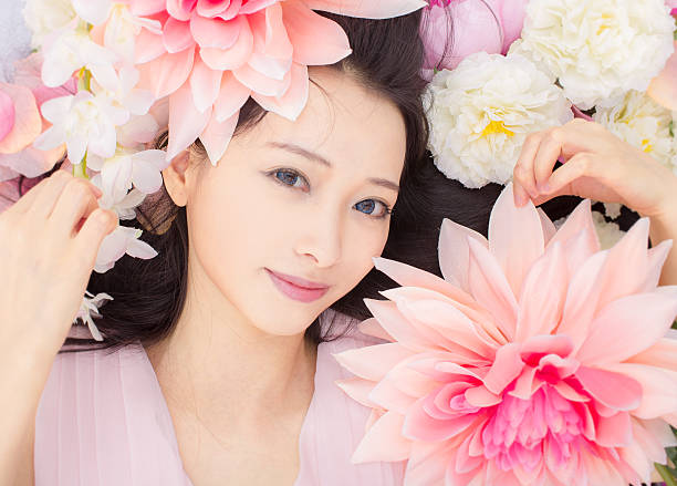 istock girl in flowers sleeping spa 464864356