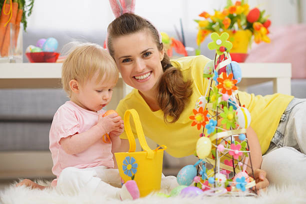 istock baby and mother spending time together on easter 464864922