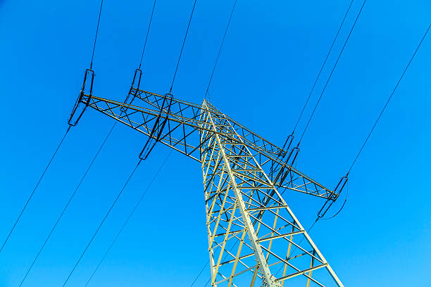 istock Transmission tower with power lines 464868980