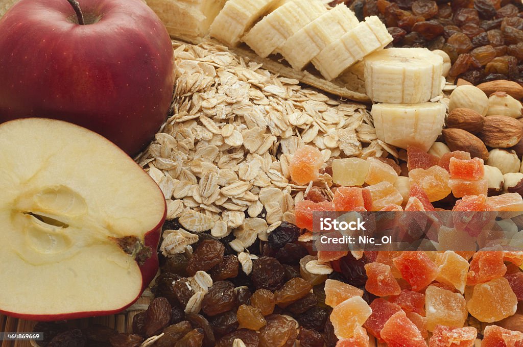 oatmeal with apples oatmeal with apples,raisins,bananas, candied fruit and nuts Almond Stock Photo
