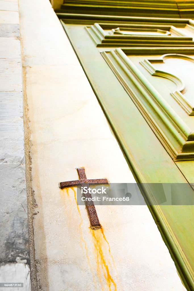 Iron cross snuggled in stone Iron cross snuggled in stone - concept image 2015 Stock Photo