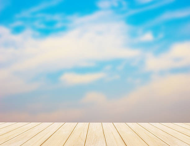 istock blur, blue sky Backgrounds and Wood Floor 464873458