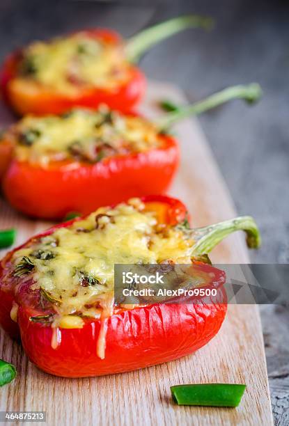 Stuffed Peppers With Meat Presented On A Wooden Board Stock Photo - Download Image Now