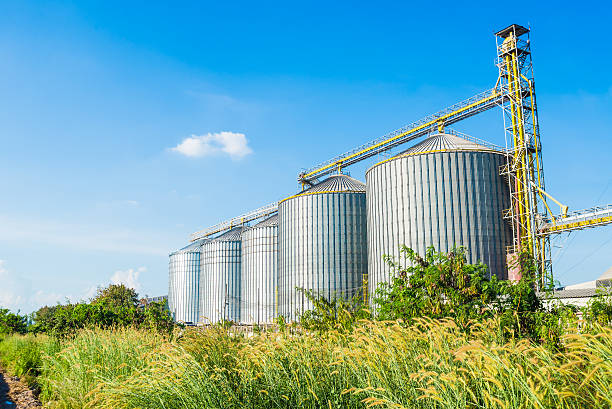 istock factory manufacture animal feed with blue sky 464875835