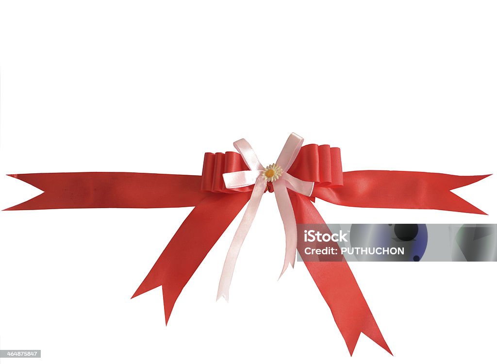 Red bow on a white background red festive bow made from ribbon, isolated on white Animal Fin Stock Photo