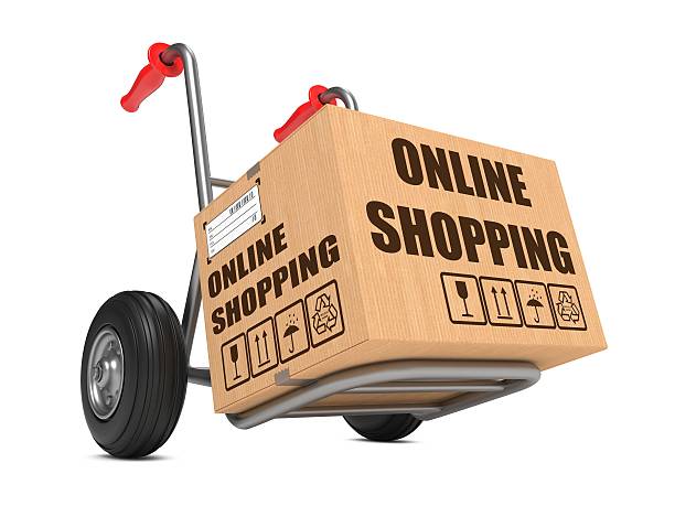 istock Online Shopping - Cardboard Box on Hand Truck. 464877601