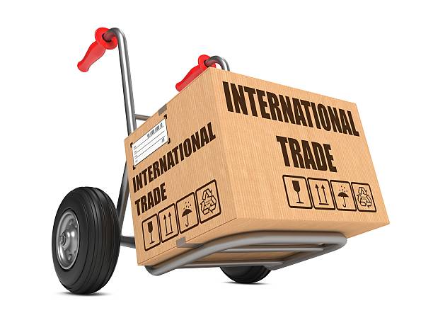 istock International Trade - Cardboard Box on Hand Truck. 464877609