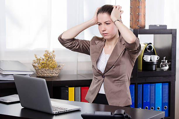 istock business woman with notebook 464877864