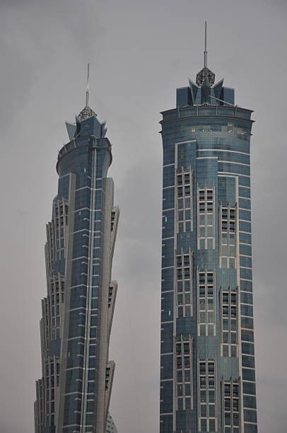 Dubai, UAE - February 19, 2014: JW Marriott Marquis Dubai, UAE. It is the worlds tallest hotel, a 72-storey, 355 m (1,165 ft) twin-tower skyscraper complex.