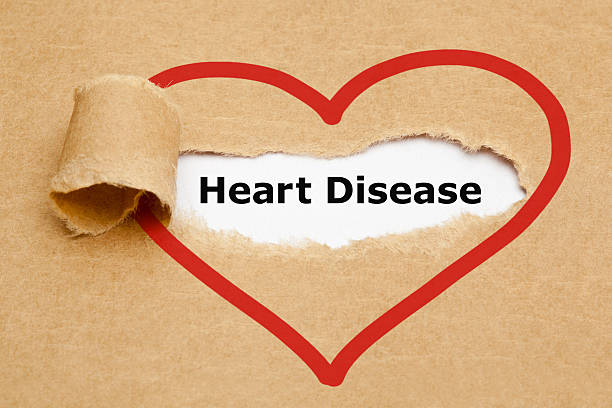 istock Heart Disease Torn Paper 464884368