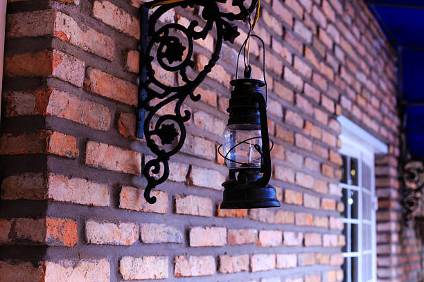 Old oil lamp hanging wall