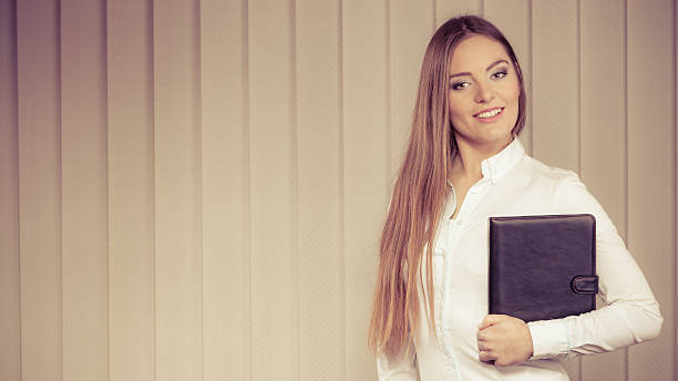 istock Elegant woman with briefcase 464886990