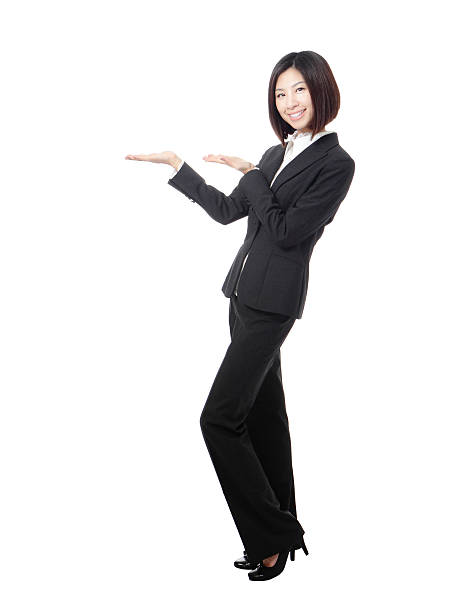 istock Full length Business woman introducing 464889149