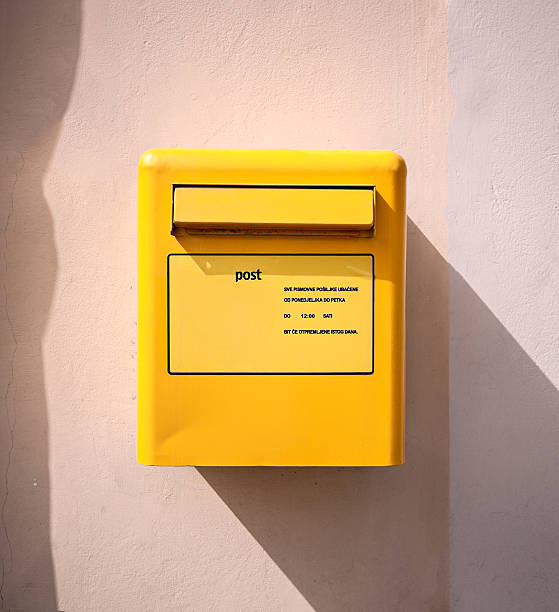 istock letter mail delivery post yellow box at wall 464889449