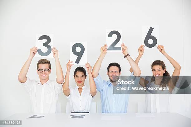 Panel Judges Holding Score Signs Stock Photo - Download Image Now - Score Card, Judge - Law, Holding